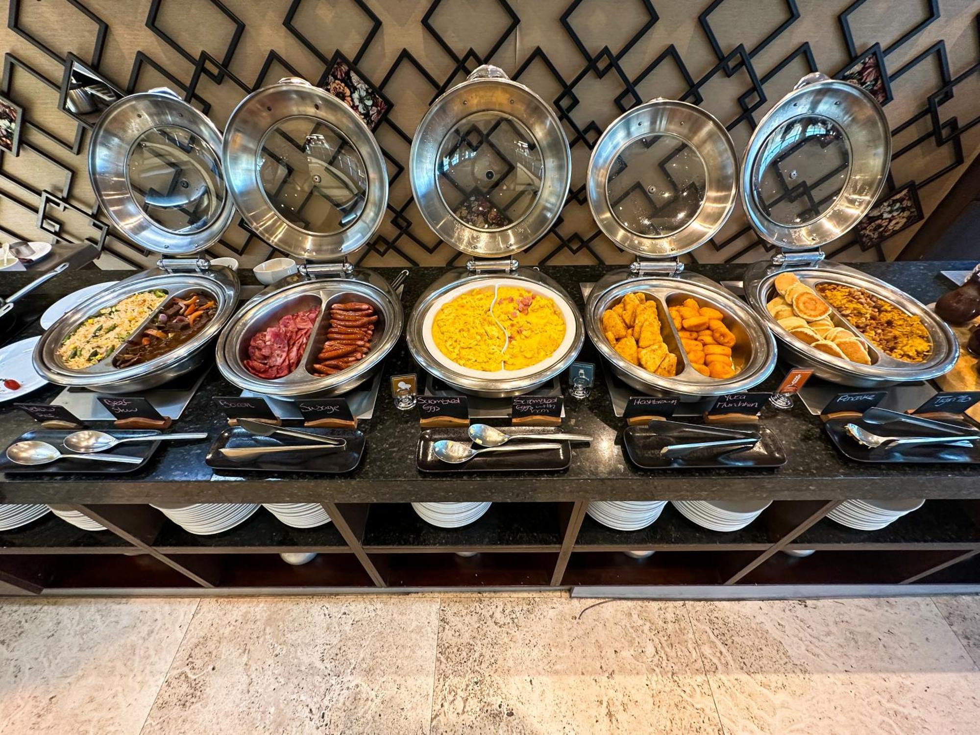 Wyndham Quito Airport Hotel Puembo Exterior photo A selection of chafing dishes at a buffet